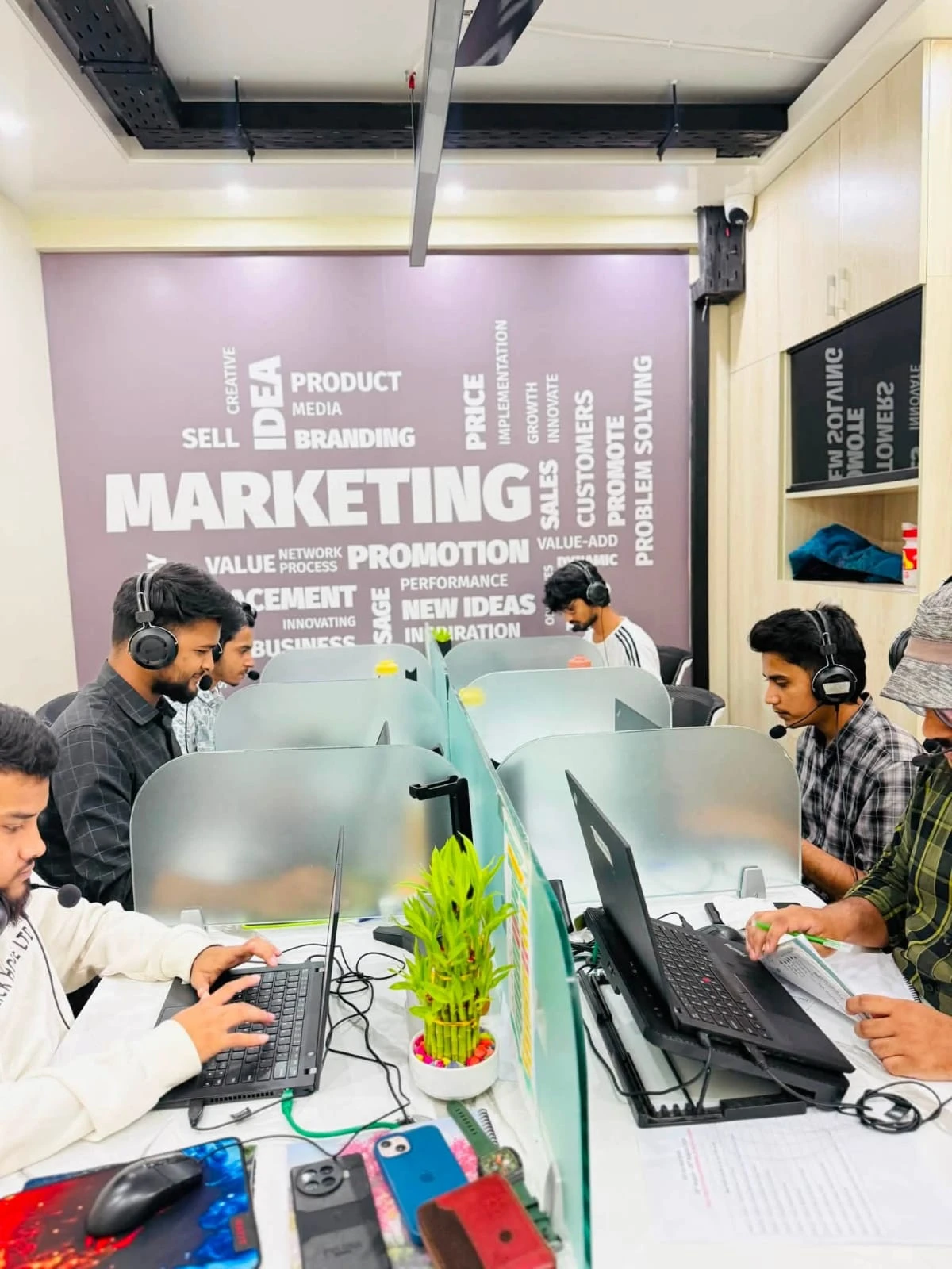 Client communications and marketing team coordinating global brand campaigns and schedules at Studio Click House