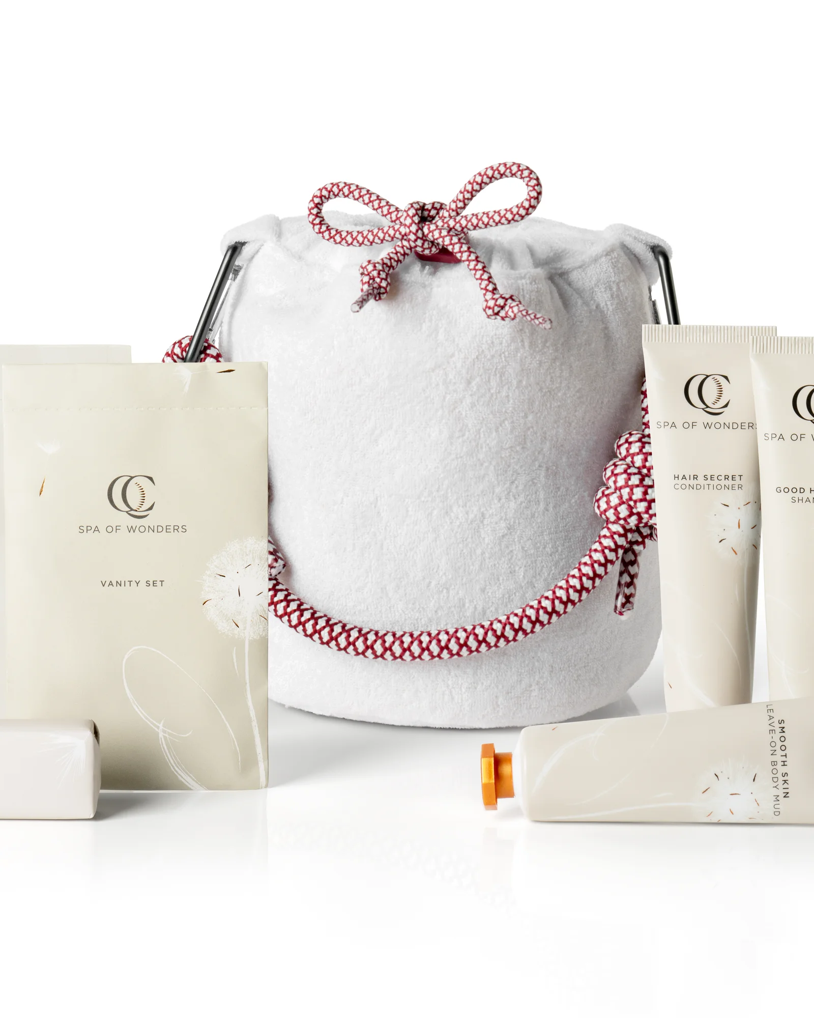 Terrycloth bucket bag reference arrangement with spa cosmetic products lineup