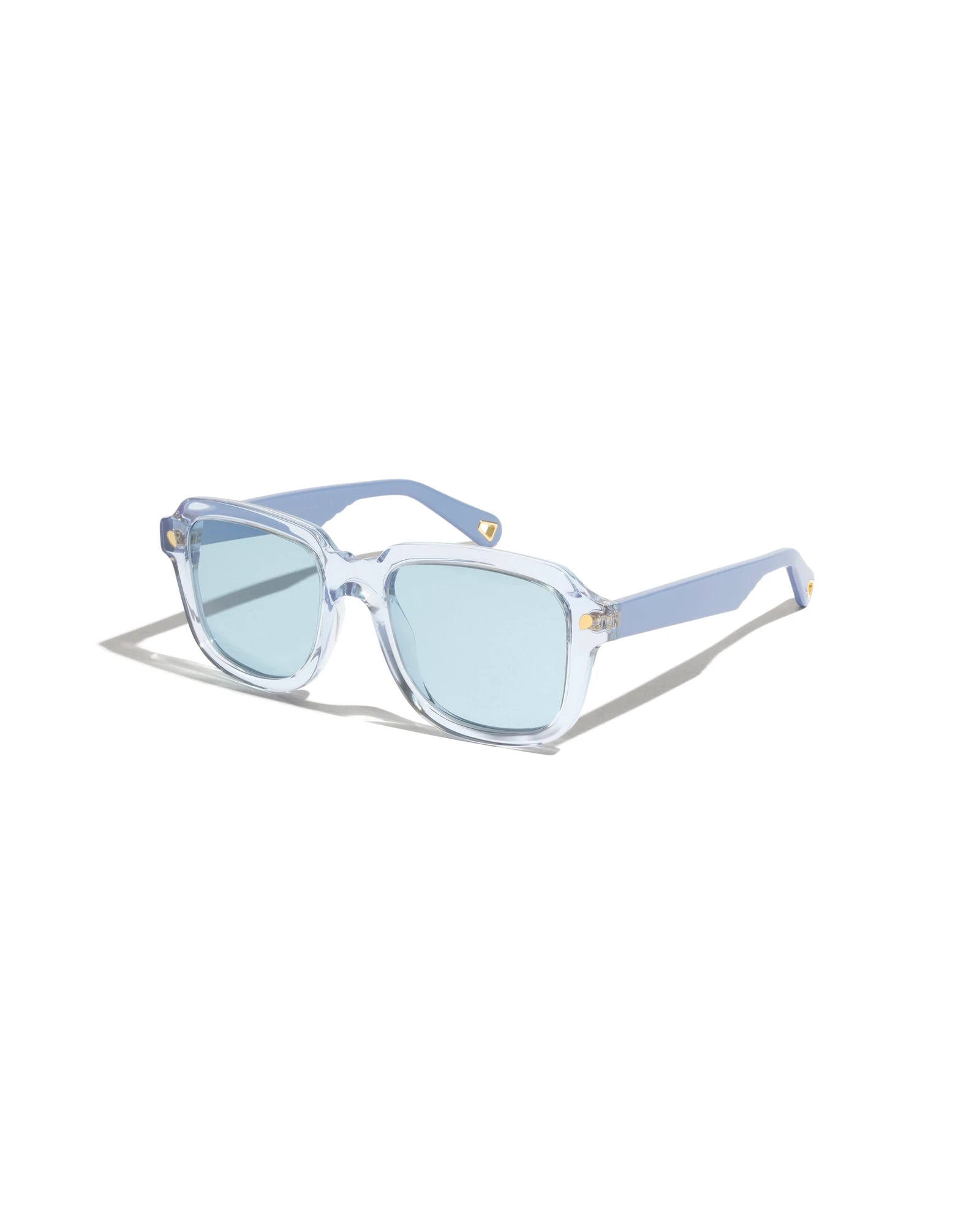 Designer sunglasses shown in side profile before retouching