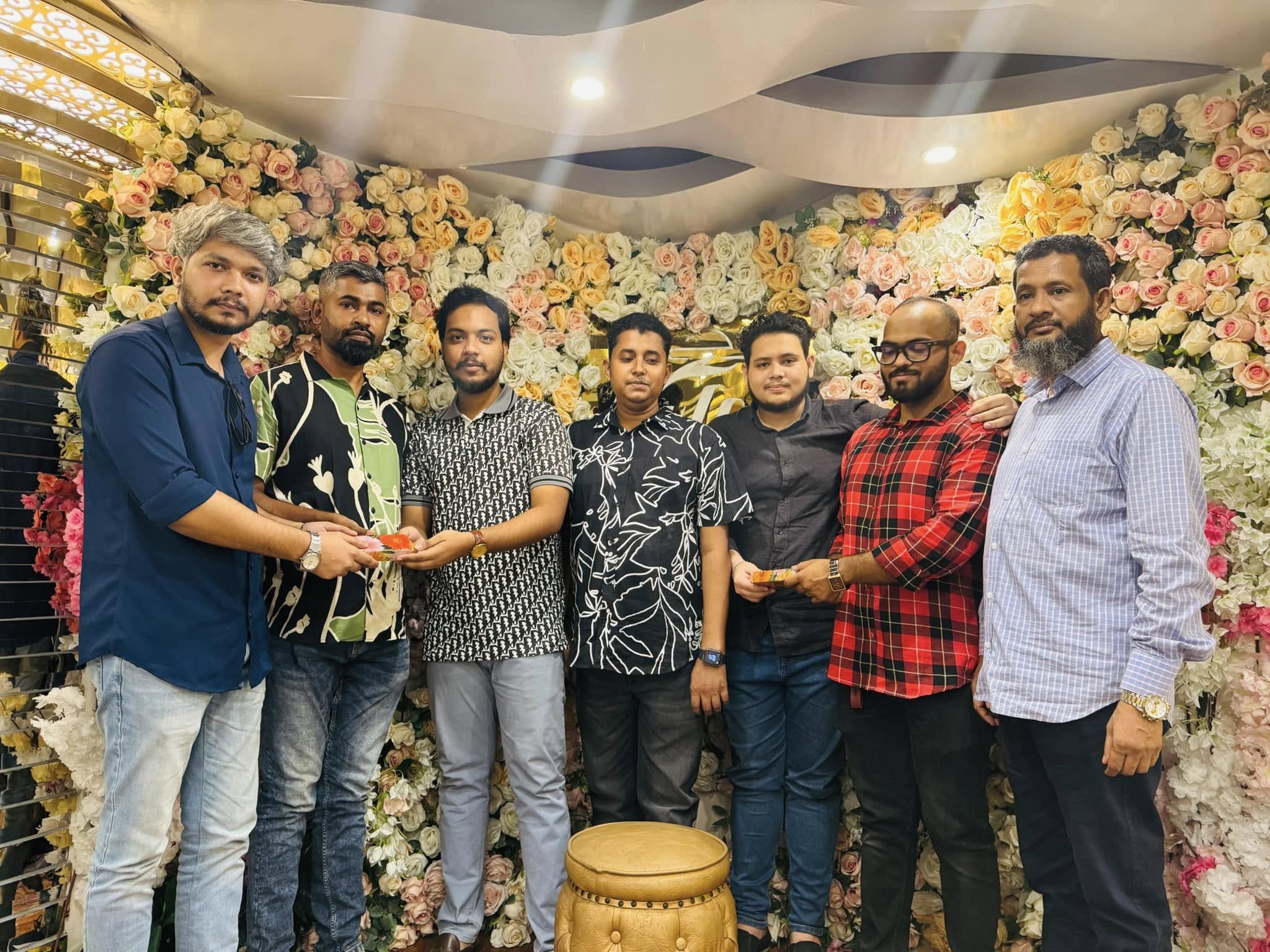 Studio Click House team group toast at annual celebratory dinner