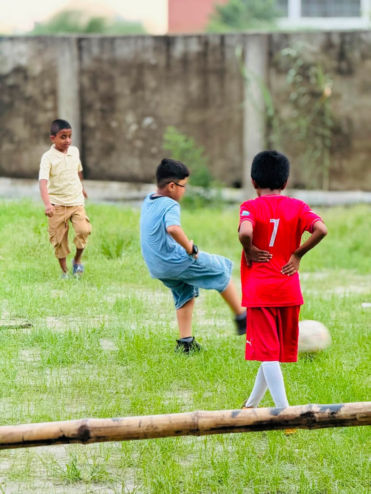 Studio Click House players competing for the ball during match