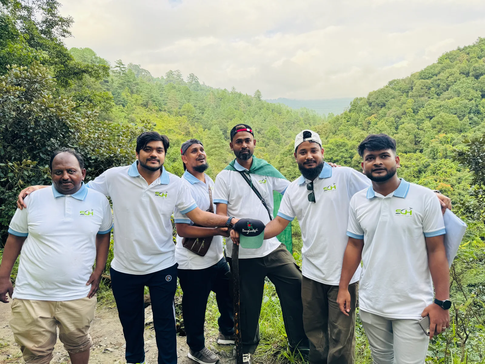 Studio Click House creative crew group portrait on mountain ridge