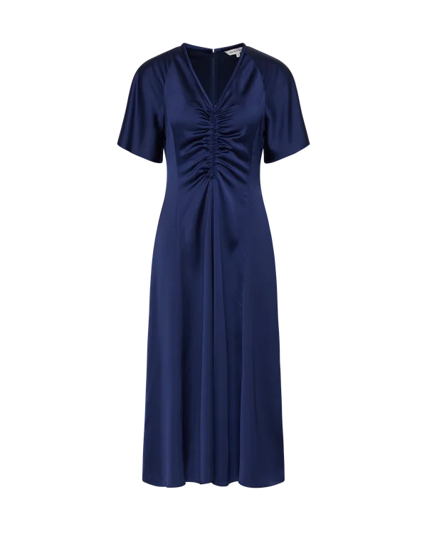 Black couture evening gown with sculptural ruffle detailing on a ghost mannequin