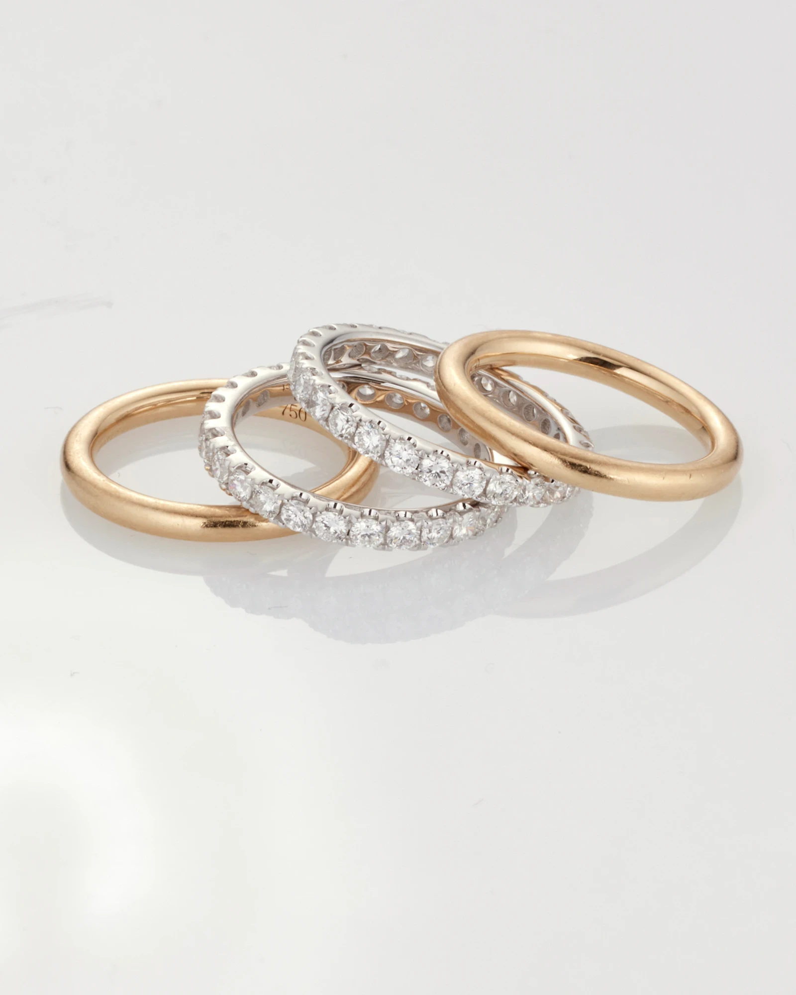 Gold ring with aquamarine and emerald gemstones